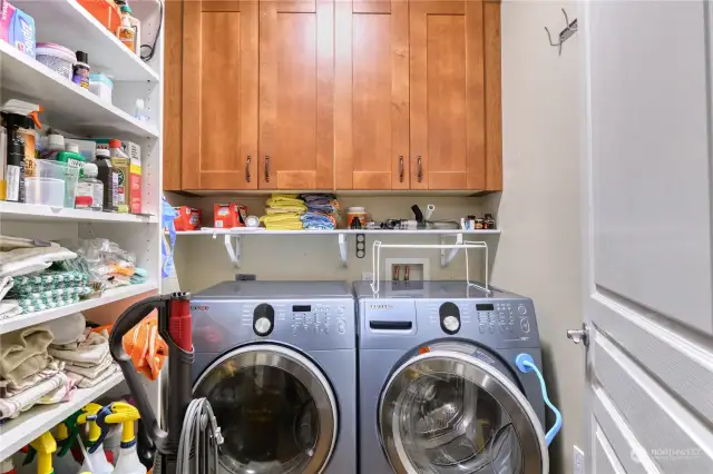 Spacious Laundry Room with shelving for storage