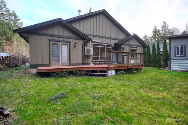 Nice deck on the back of the house for outside BBQ's. French doors off of the primary bedroom.