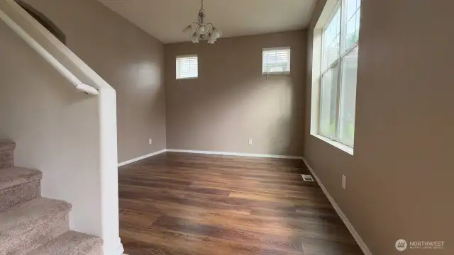 Entry facing stairs and formal dining room