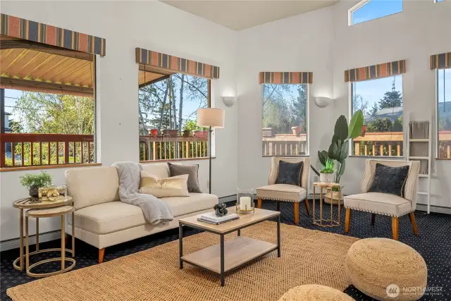 This sunken living room offers a spacious gathering place as part of the great room design.