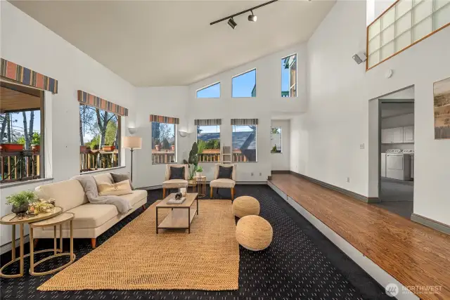 Let's head down the hallway to the bonus room and main floor bedroom.