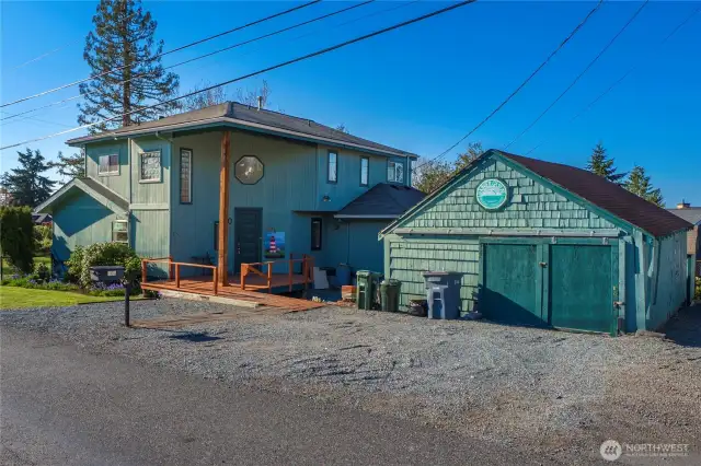The house was built in 1987 but the property still shows signs of earlier history with this original NE Tacoma garage/shop.