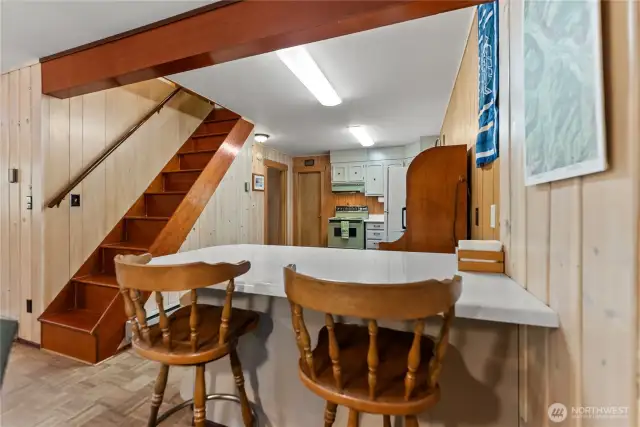 Cozy breakfast nook tucked —perfect for morning coffee or casual meals. Warm wood accents and built-in charm make this a welcoming space for conversation and comfort.