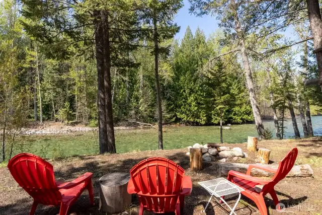 Riverfront Fire Pit Retreat  Gather with friends and family under the trees by the fire, with the Methow River as your backdrop. S’mores, stories, and starry skies await in this unforgettable outdoor living space.