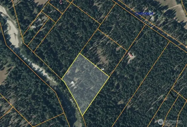 Property Aerial Map  5.01 forested acres along the Methow River, outlined here for clarity. Enjoy privacy, access to trails, and views in every direction—your own slice of Mazama heaven.