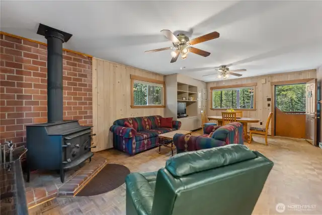Spacious great room concept with brand-new windows that bring in natural light and frame the beautiful river view.