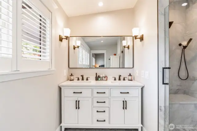 En-suite bathroom with heated floors, dual sinks and walk in shower. Lots of natural light and vaulted ceiling.