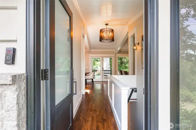 The home welcomes you with fresh interiors, abundant skylights and amazing natural light throughout. Recent upgrades include new windows and doors, a fabulous metal roof, designer Restoration Hardware lighting fixtures, elegant white oak hardwood and exquisite natural stone surfaces throughout.