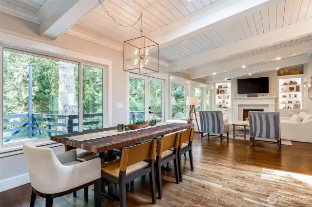 The thoughtfully designed floor plan creates seamless transitions from the spacious living area to versatile dining spaces, both indoors and al fresco.