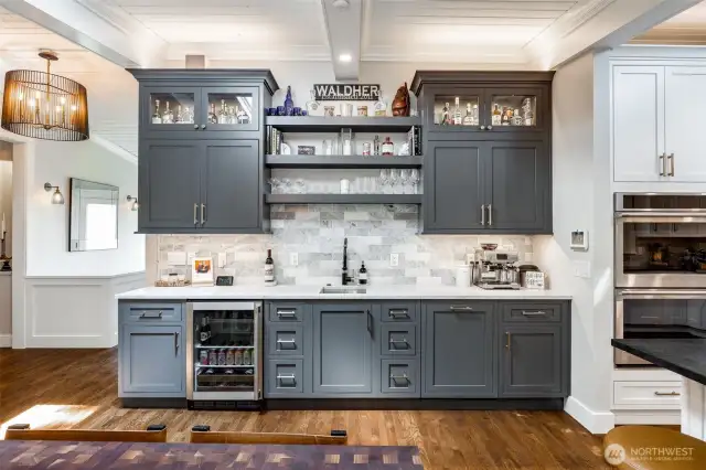 We love this entertaining bar complete with beverage refrigerator, sink and second dishwasher.  An entertainer's dream!