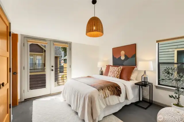 Guest bedroom on top floor with vaulted ceilings