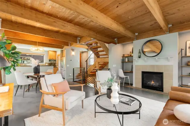 Open beamed living room with car decking ceilings