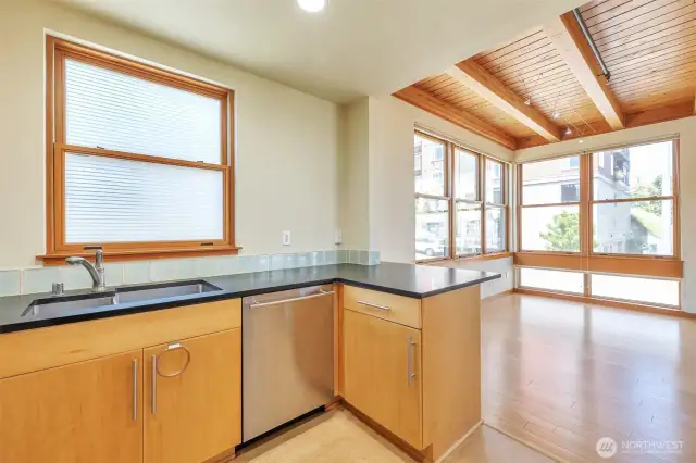 Beautiful double-hung wood wrapped Andersen windows throughout the unit.