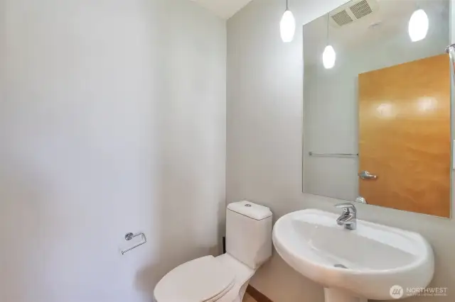 Guest half bath on 2nd level off of living room.