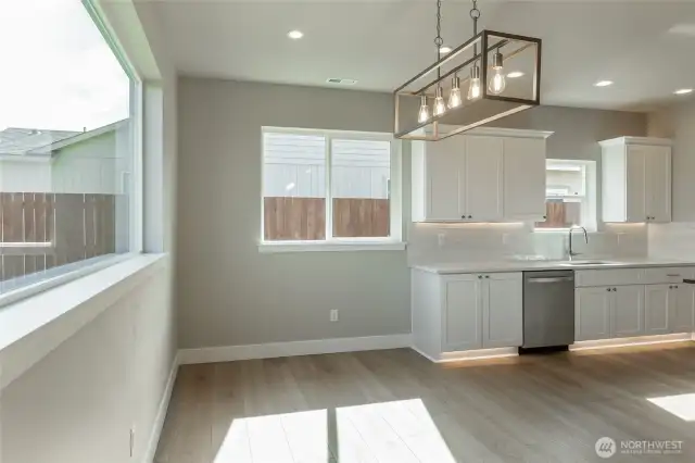 Large open dining room area with plenty of light, like home