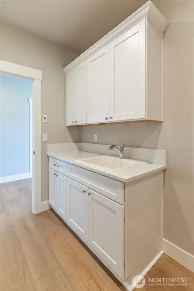 Laundry area with sink and cabinets, like home