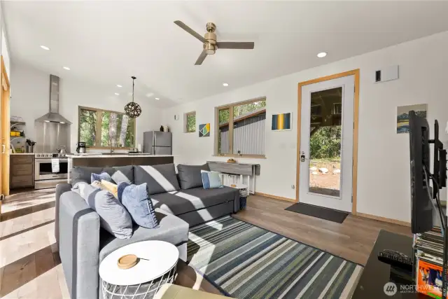Tranquil setting — Every window frames forested beauty, bringing nature into daily life.