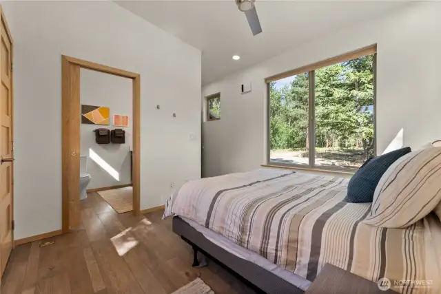 Clean, efficient bath with walk-in shower – Modern finishes, brushed nickel fixtures, and fresh design throughout.