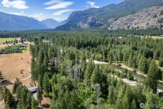 Dramatic Mazama landscape surrounds the home with mountain and meadow vistas.