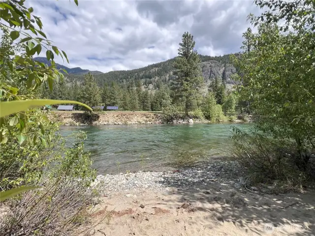 Private river access just steps away—launch a float or soak in the scenery.