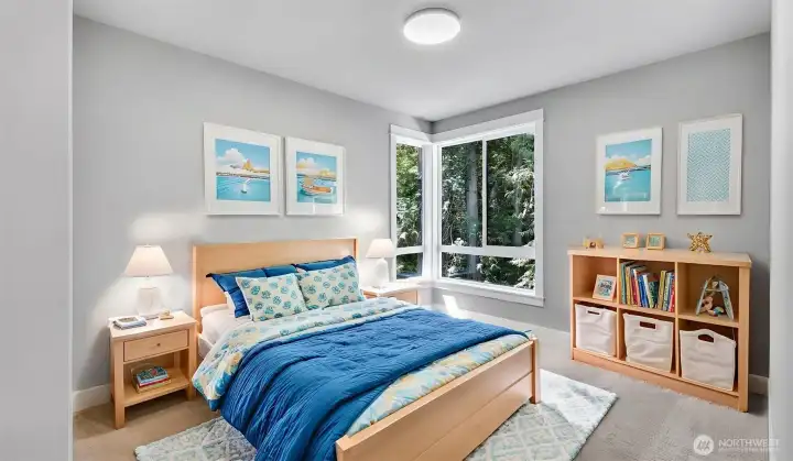 2nd of four bedrooms on the Upper Level. Virtually staged.