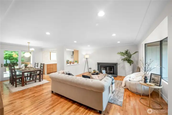 Recessed lighting, fireplace and bay window