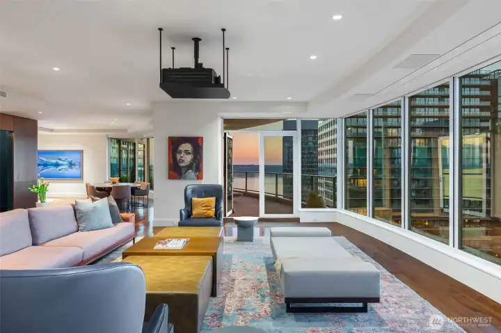 Beautiful, serene spaces for gathering. This one converts to a media room; black-out shades in tracks to block the light. Built-in speakers. Hidden cabinetry for components.
