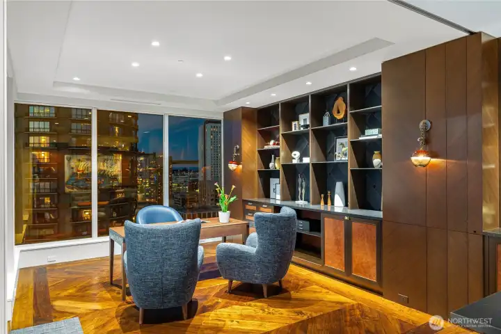 Harriett Industries, Kaleen Leathers and enchanting jeweled light fixtures continue into the commanding office. Do your best work over herringbone walnut floors with a tremendous view. Want privacy? Retractable nesting doors emerge from the book-matched walnut cabinetry.