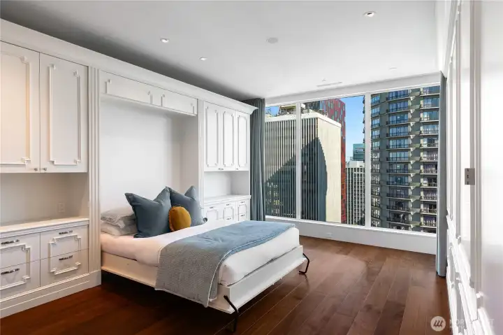 Stusser Woodworks for the win with a very well-hidden wall bed.