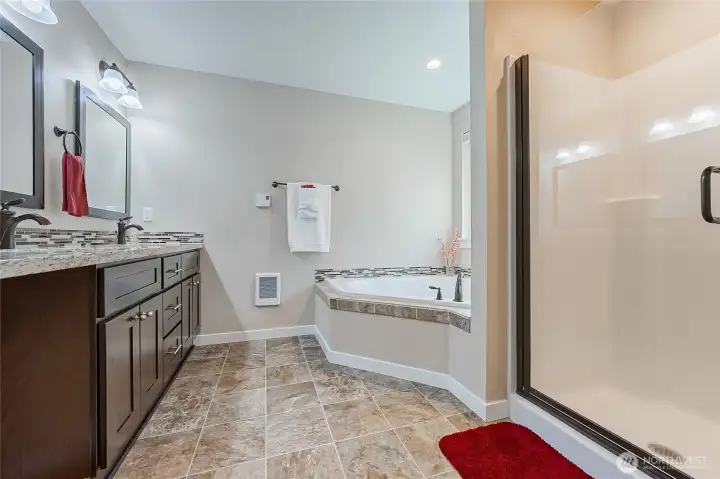 5-piece master ensuite with extra long double vanity, granite countertop, soaking tub, separate shower. WC not shown in this photo.