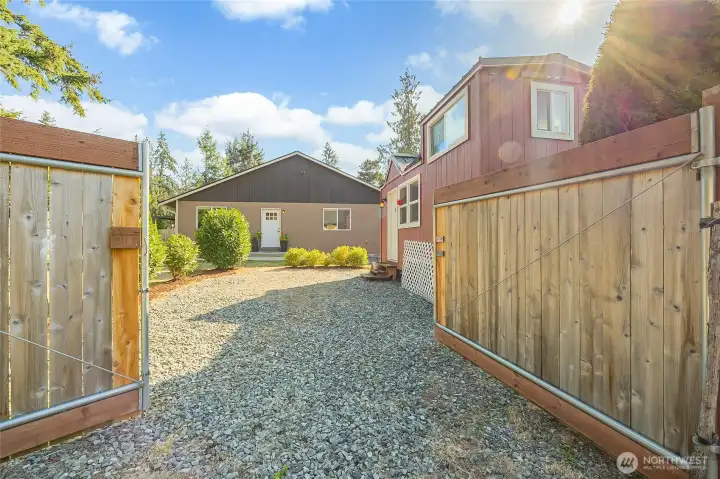 Wide gates that open to back alley. RV parking.