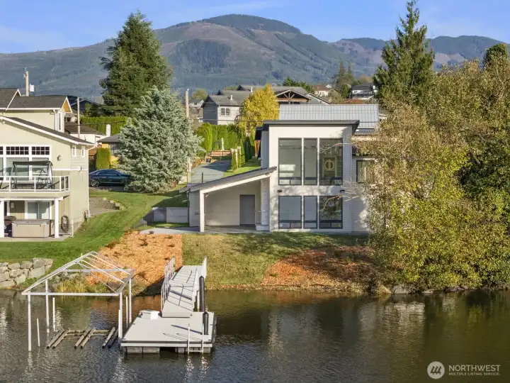 The curb appeal of this new home is just stunning with the heated outdoor living space that opens to the uncovered patio.