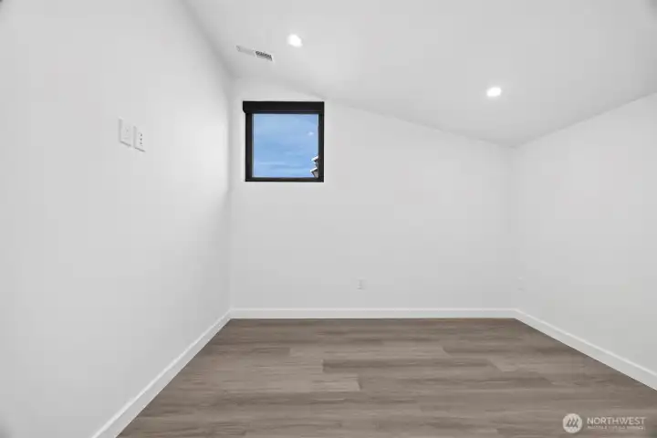 The second bedroom is nicely sized and has a westerly facing window.