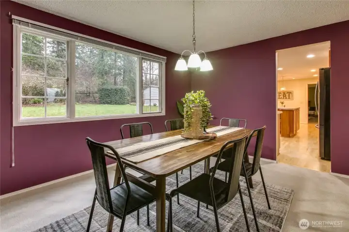 Generous dining room open to kitchen and living