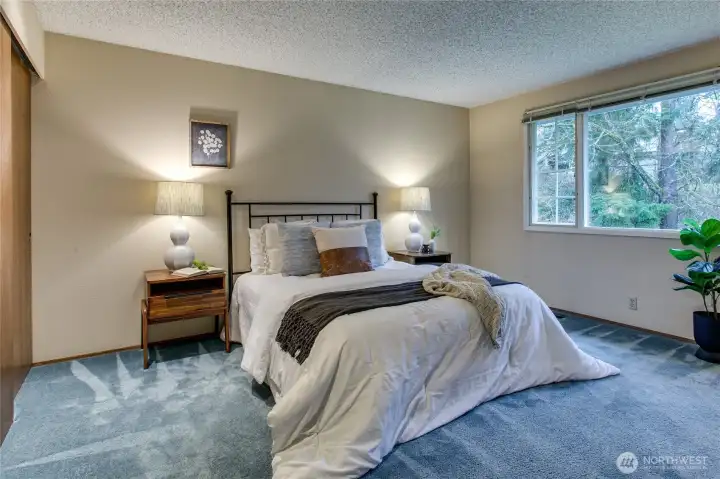 Second story primary suite w/ double closets