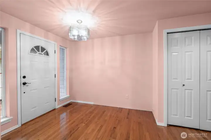 Entry way with coat closet.