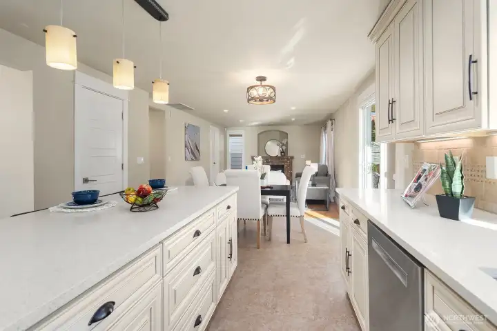 Looking from the induction stove towards the informal dining and family room.