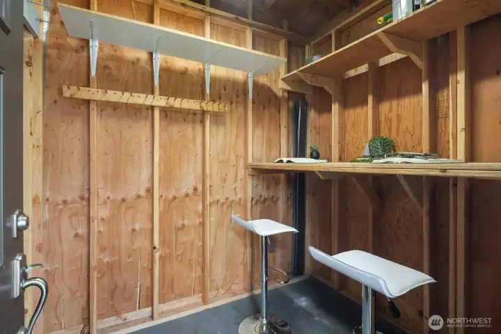 Shed has lights and offers a quiet retreat.