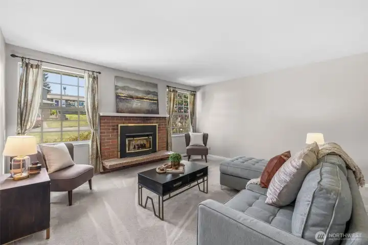 Formal living room. Cozy fireplace for evenings in or to simply compliment your gatherings.