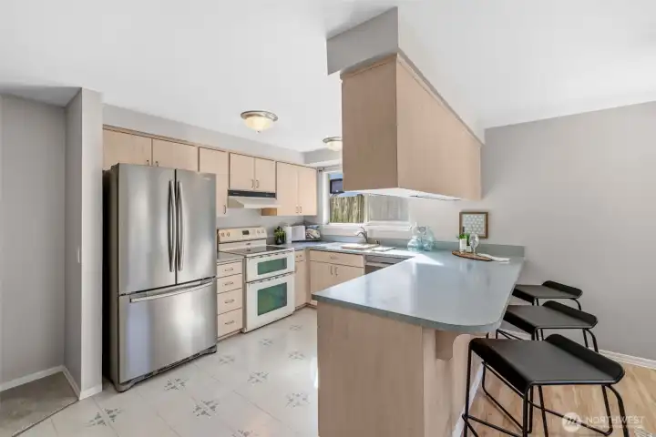 Plenty of cabinetry and food preparation space.