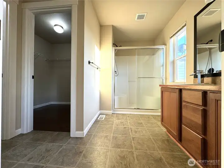 Master bath with walk-in closet