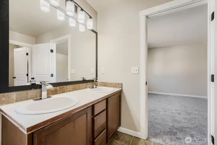 Dual sinks in primary bathroom.