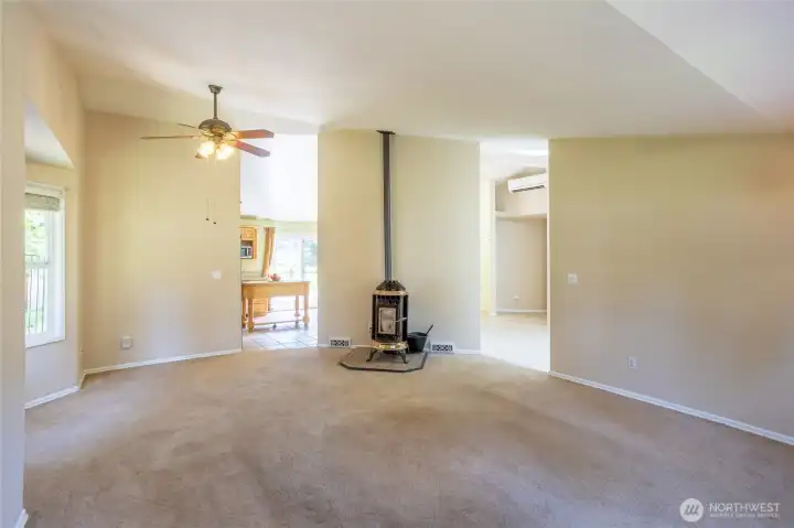 Nice sized living room off the kitchen with space for dining table.