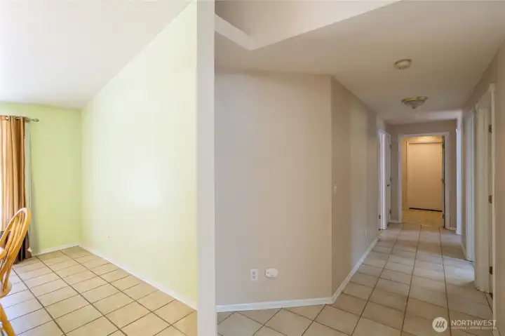 Hallway leads to bedrooms, bathroom & indoor utility room.