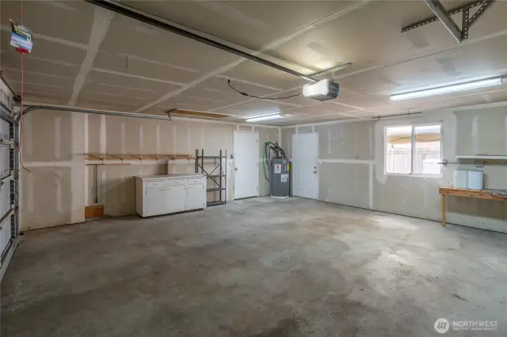 Doorway leads out to hot tub & fenced back yard.