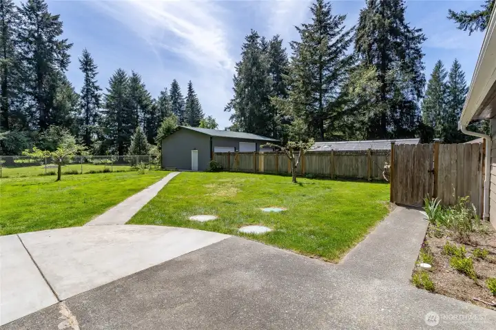 Large fenced backyard with gate leading to rest of your property.