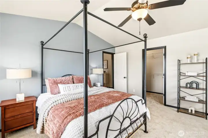 primary suite with walk in closet