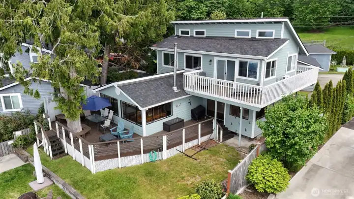 Tiered yard, Main Level Deck & upper level primary room wraparound deck