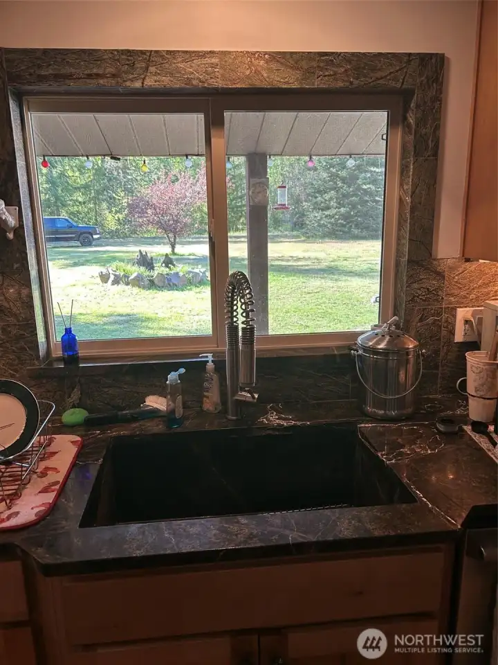Large Stone Farm sink and custom stone window trim