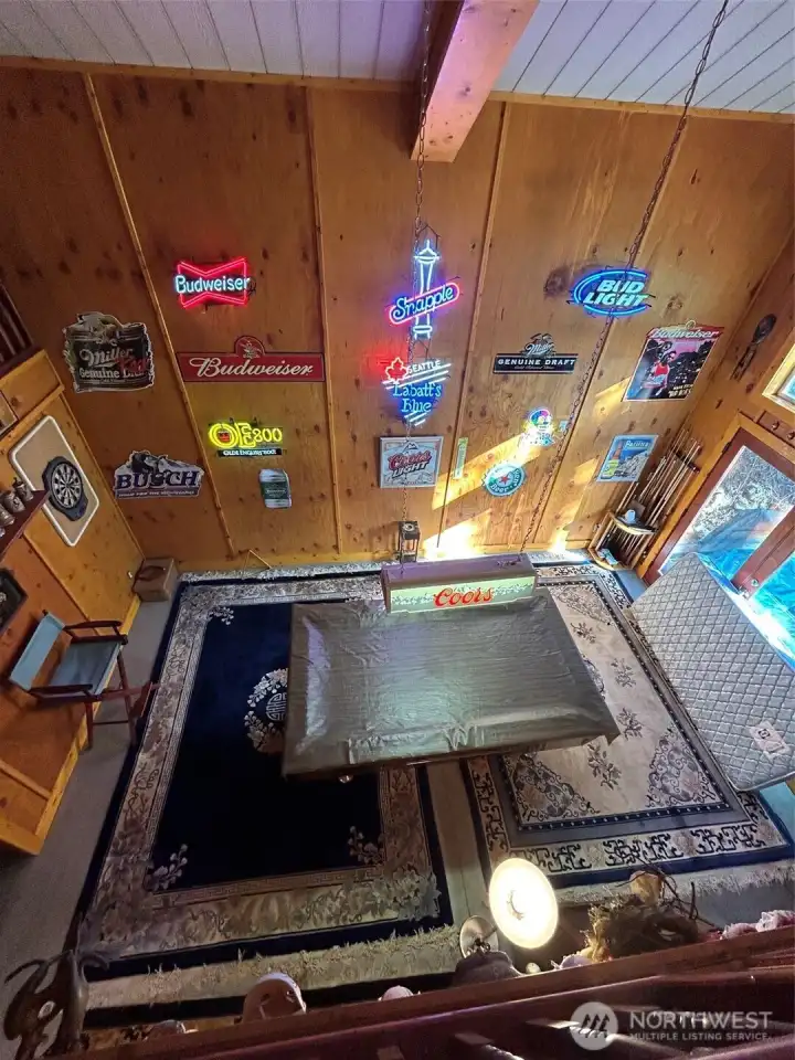 Pool table and Neon from loft